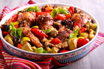 Baked drumsticks with vegetables