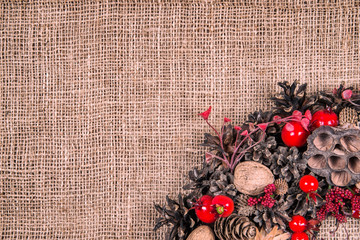 Fototapeta na wymiar Christmas wreath on an old brown cloth background