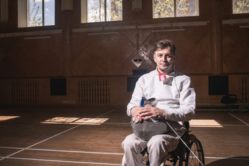portrait of a disabled fencers during training in hall