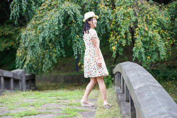 a portrait of beautiful woman in the park