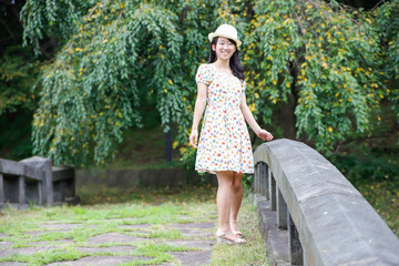 a portrait of beautiful woman in the park