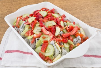Ceramic Tray with Delicious Fresh Fruits Salad