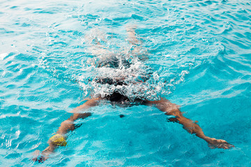 Woman diving in a swimming pool