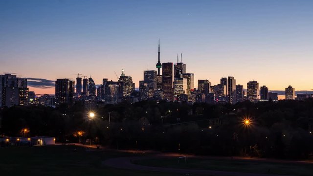 Ultra high definition 4K day-to-night timelapse of the skyline in Toronto, Canada.