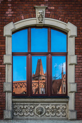Window reflection of an old historical building