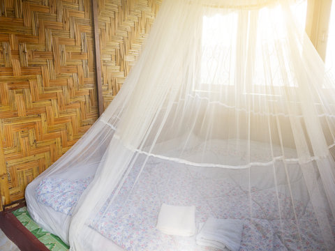Bedroom with net in the countryside of Thailand