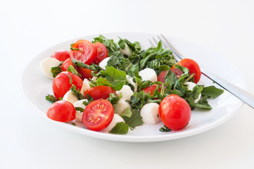 salad of tomato, mozzarella and rucola
