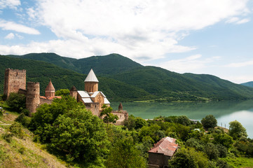 Fototapeta na wymiar Summer view of Ananuri church and fortress in Georgia