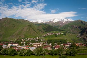 Stepantsminda village in the mountains of Georgia
