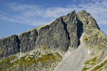 High Tatras in Slovakia. Monumental peaks. Summer scenic landscape mountain view. Alpine trail. Javorovy peak in Big cold valley.