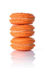 French dessert. Sweet macaroons or macarons with orange flavor