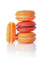 French dessert. Sweet red and orange macaroons or macarons