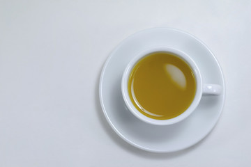 Water the corn in a white cup.Clipping Path.