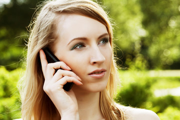 Naklejka premium Woman using mobile phone 