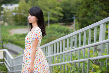 a portrait of beautiful woman in the park