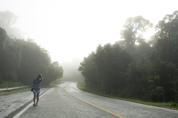Woman in mist land, Fog background
