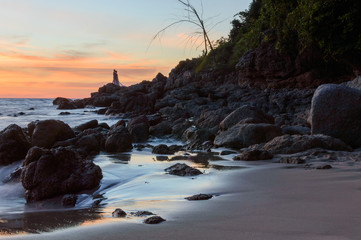 Fototapeta na wymiar Sunrise or Sunset over the sea view from tropical beach with orange sky