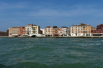 Obraz premium View from the sea at the residential district of waterside with bridge in Venezia, Venice, Italy, Europe 