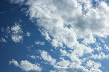 white clouds running on blue sky          