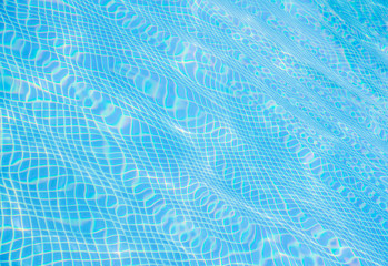 Naklejka na ściany i meble Blue water in swimming pool