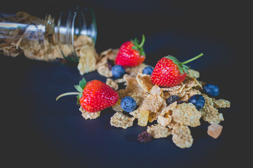 whole grain cereal flakes which mixed berry fruit and raisins