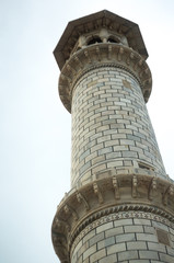 Beautiful marble minaret towers of the Taj Mahal. These amazing feats of architecture stand 130 feet tall. The architecture and carving on these make it really beautiful