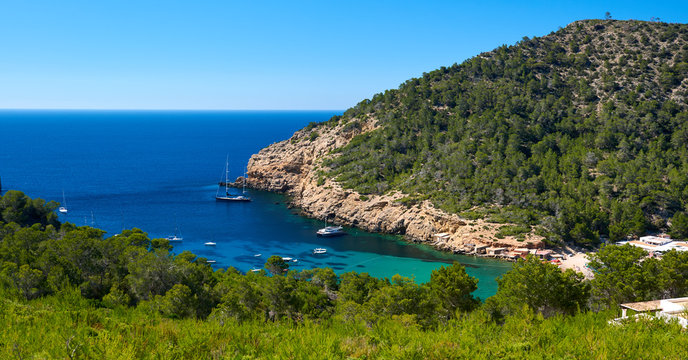 Rocky coastline of Benirras in Ibiza Island. Spain