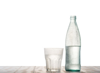 Glass and a bottle of ice water