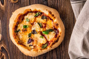 Pizza with mozzarella and tomato sauce.