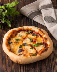 Pizza with mozzarella and tomato sauce.