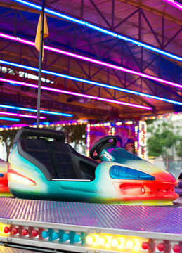 Colorful Electric Bumper Car In Amusement Park.