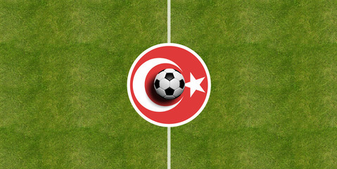 Naklejka premium Turkey flag on a soccer field center