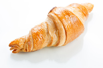 Croissant on white background. Top view.