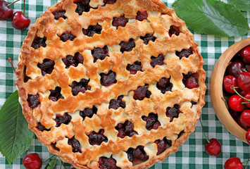 Tasty cherry pie on table