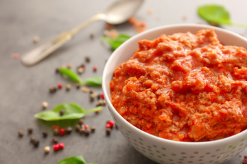 Meat sauce in ceramic bowl on kitchen table
