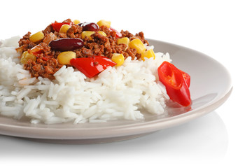Chili con carne served with rice on plate against white background