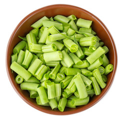 Bowl with fresh green beans on white background