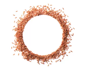 Foto op Canvas Round frame made with red rice on white background © Africa Studio