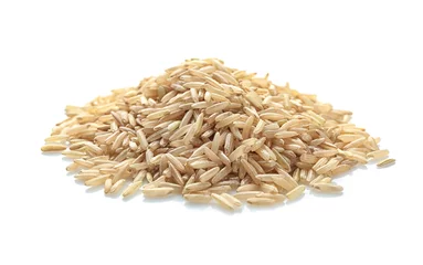  Pile of brown rice on white background © Africa Studio