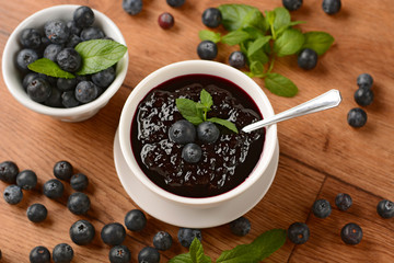 homemade blueberry jam with fruits around