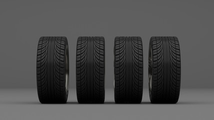 Vier Reifen stehen vor einem Hintergrund