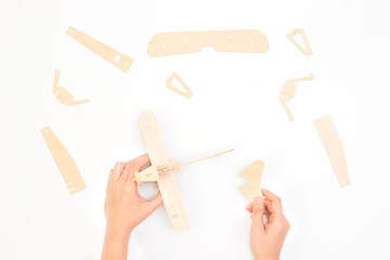 Creating or building own business concept. Puzzle airplane piece, construction and development, build construct, idea and success, solution and growth. Minimal concept.