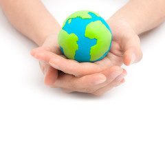Hands and earth isolated on white background. Concept Save green planet.