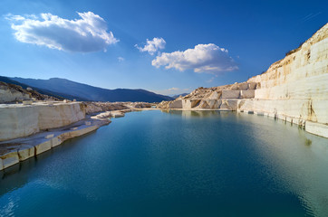 Beautiful blue water and blue sky of marble lake located in Macedonia