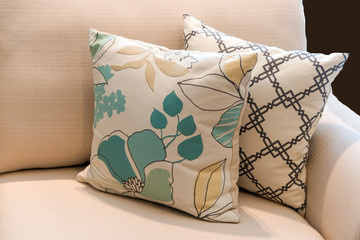 Modern fabric pillow on luxury brown fabric sofa interior decoration