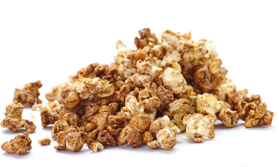 Close - up Caramel chocolate popcorn on white background