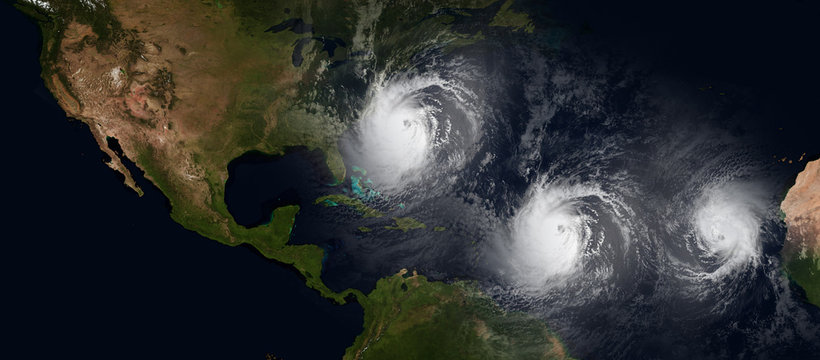 Extremely detailed and realistic high resolution 3d illustration of 3 hurricanes approaching northeast of USA. Shot from Space. Elements of this image are furnished by Nasa.