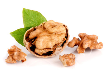 Walnut with leaf isolated on white background