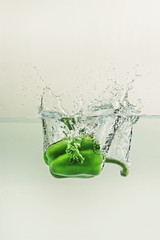 Bell pepper  falls in water