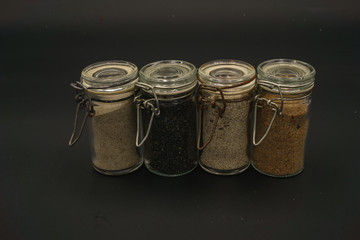 Verschiedene Sandarten in Glas